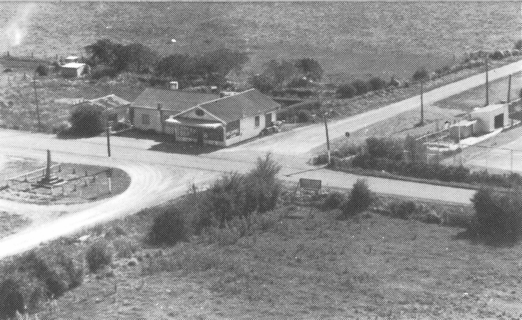 Crossroads at Eureka showing store, cenotaph and school