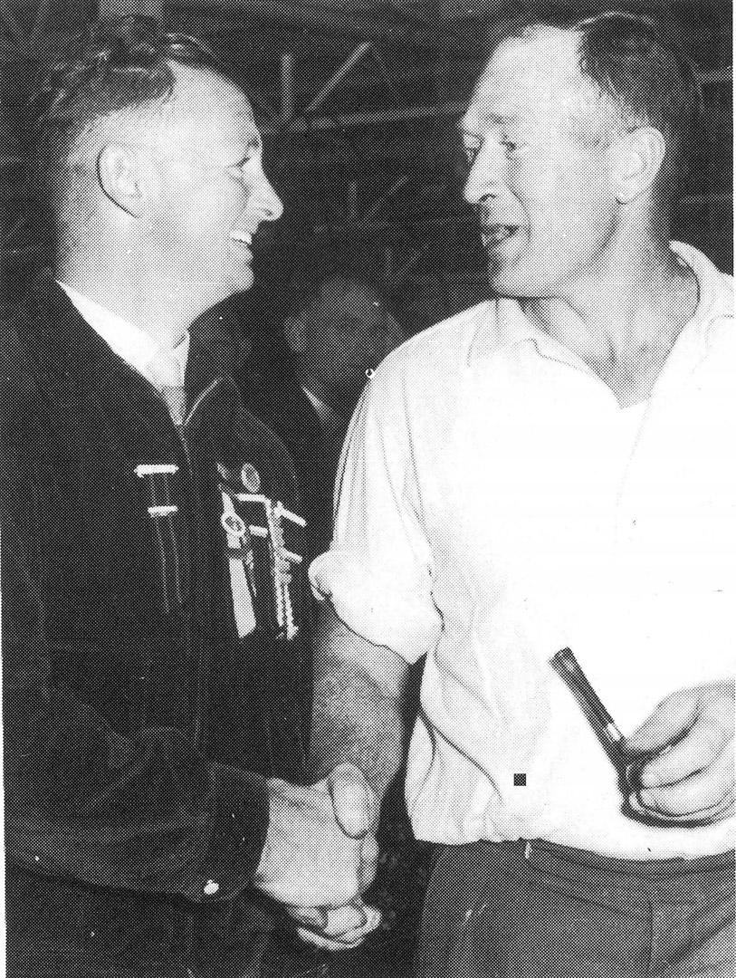 Bruce McClennan (right), winner of the National Indoor Bowls Singles, 1963, being congratulated by runner-up Russel Moore