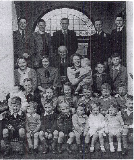Mr. J. T. Bryant, his children and grand-children outside his Matangi home.